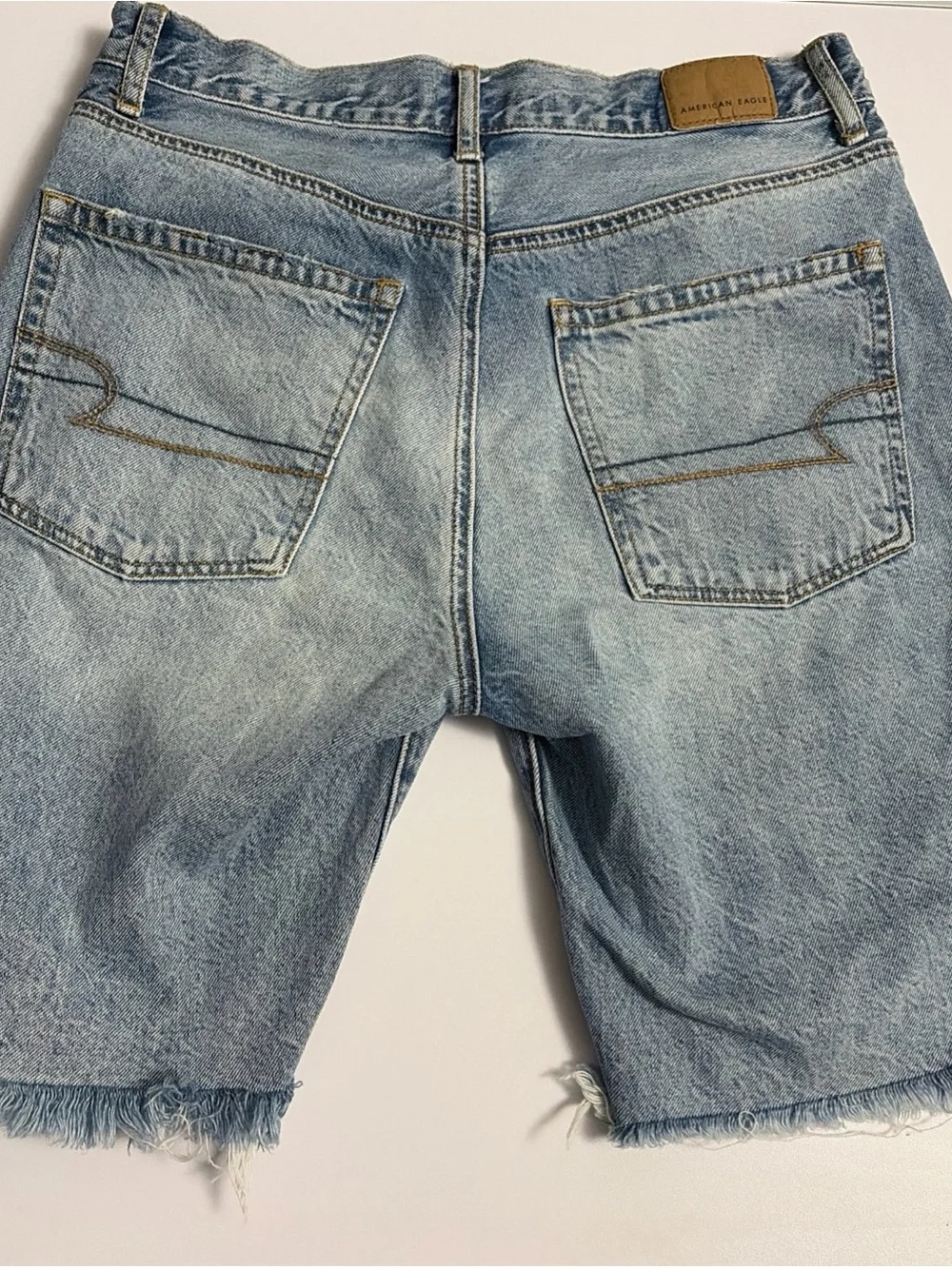 American Eagle 90’s Boyfriend Distressed Light Blue Denim‎ Cutoff Shorts